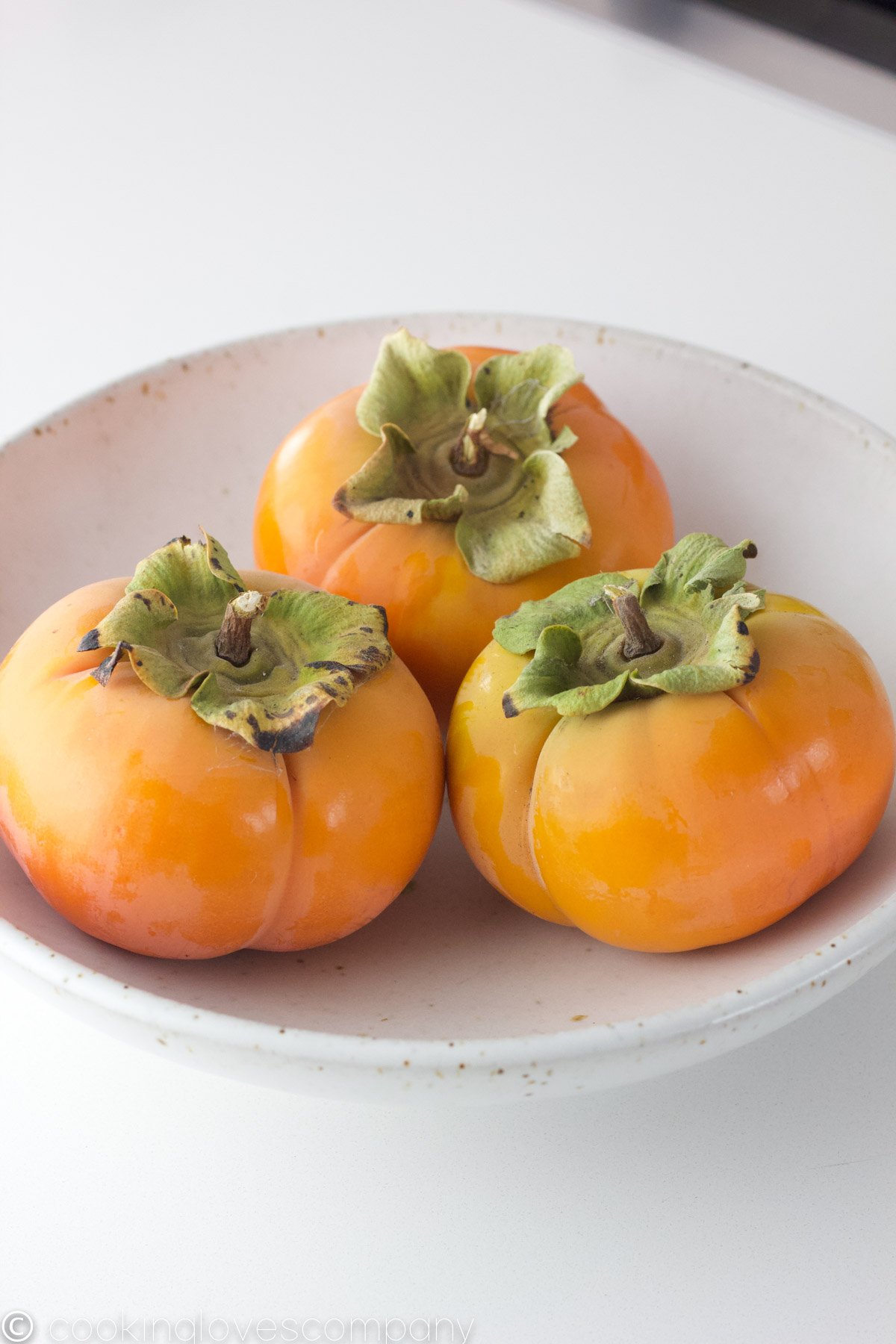 Persimmons in a bowl